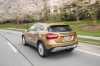 Driving 2019 Mercedes-Benz GLA 250 4MATIC from a rear left view
